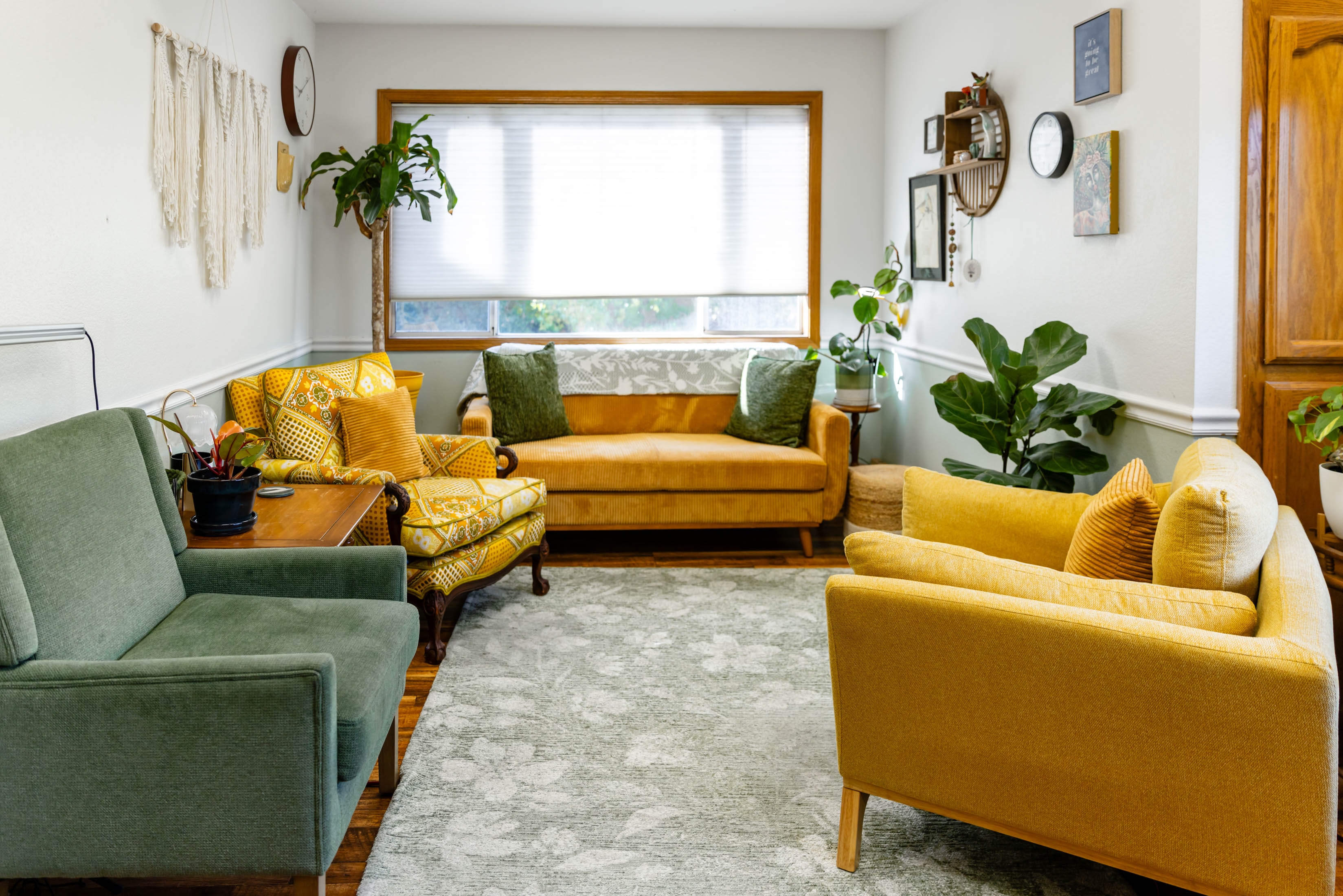 Source & Soma therapy office — warm, welcoming space with sage green and mustard seating